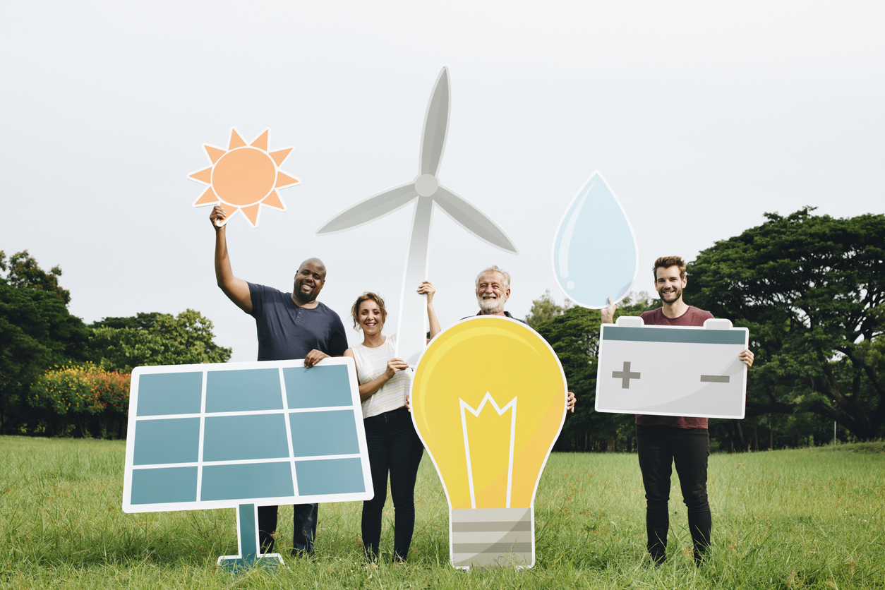 People holding energy saving icons